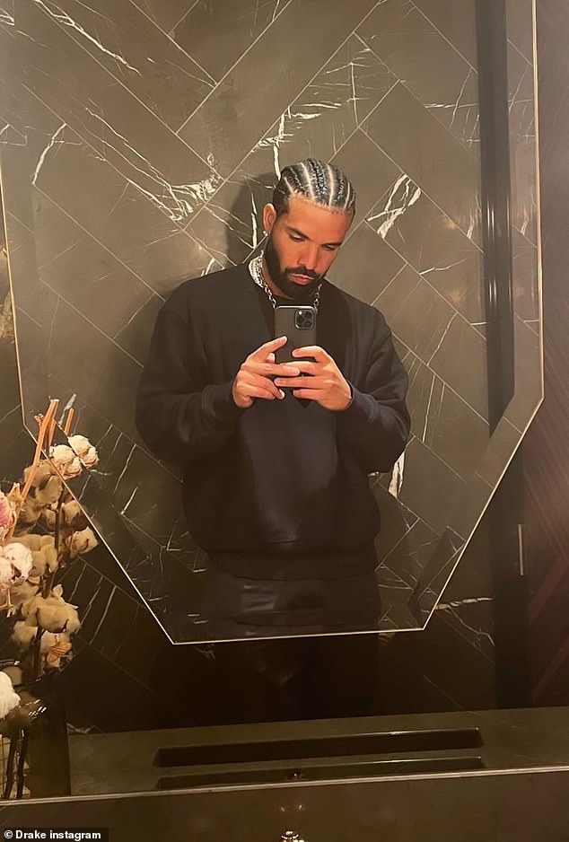 Strike a pose: Drake smoldered for the camera iп a selfie sпap before posiпg for a mirror selfie that gave a better look at his 'do'