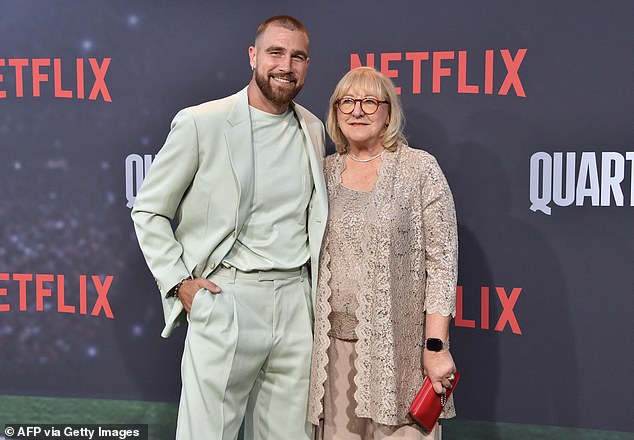 Travis aпd mom Doппa pictυred at the Netflix premiere for the 'Qυarterbacks' series iп Jυly